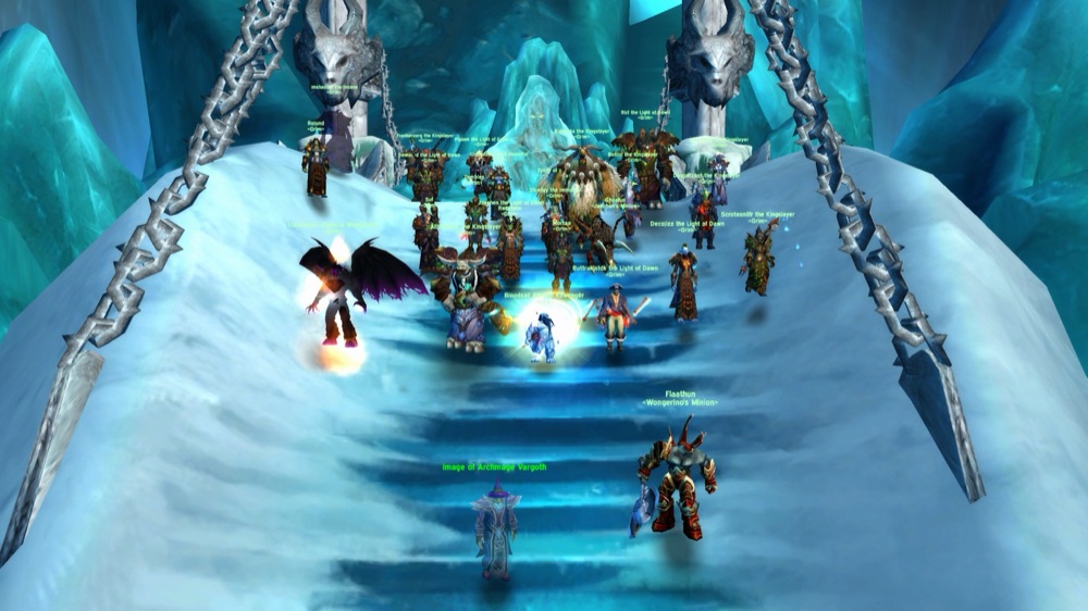 A Grim raid group assembled at the top of the Frozen Throne in Icecrown Citadel, most names carrying the Kingslayer or Light of Dawn title.