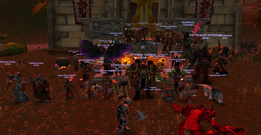 Forty Grim members packed together outside the Scarlet Enclave, nearly every nameplate showing a vanilla PvP rank.